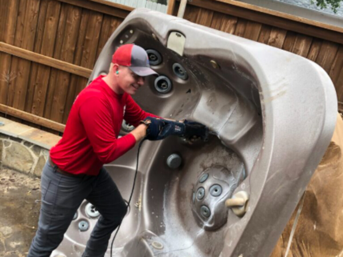Team dismantling hot tub on-site